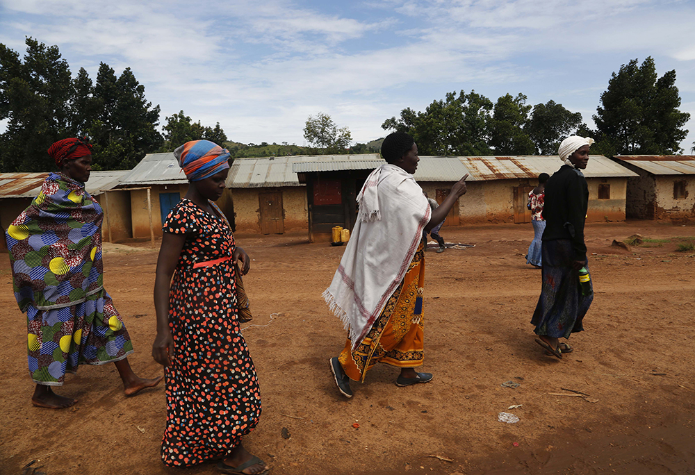 A group of women walking in the district of Kamwenge, Uganda.